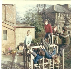 On the climbing frame in the Bee sandpit